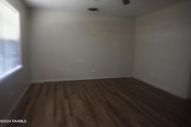 empty room featuring wood finished floors