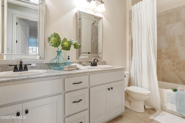 full bathroom with vanity, shower / bath combination with curtain, toilet, and tile patterned flooring