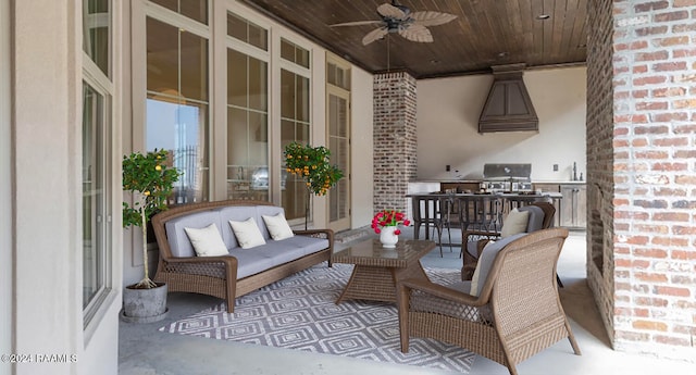 view of patio / terrace featuring a grill and ceiling fan