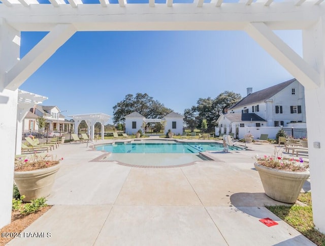 view of pool featuring a patio area