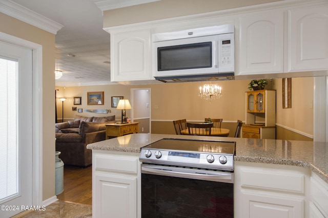 kitchen featuring light stone countertops, ornamental molding, white cabinetry, and stainless steel range with electric stovetop