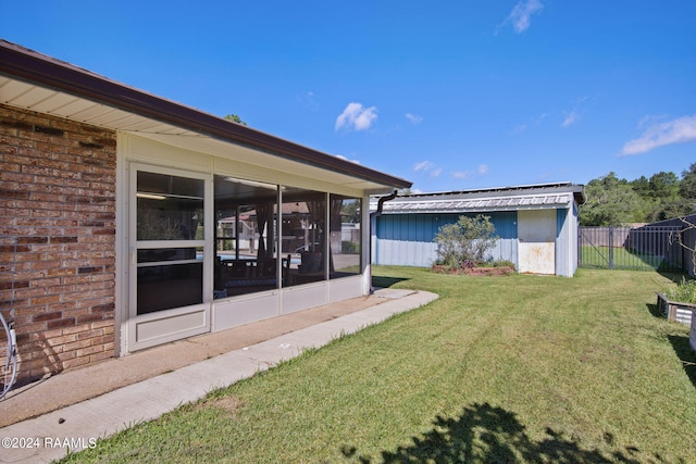 view of yard featuring a sunroom