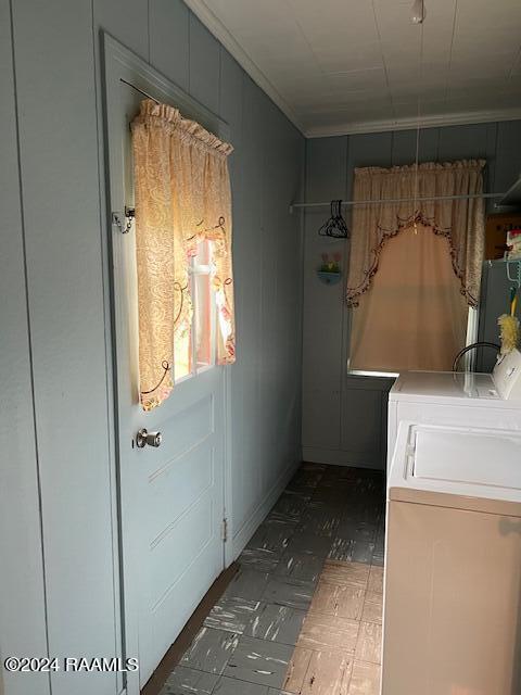 washroom featuring washer and dryer