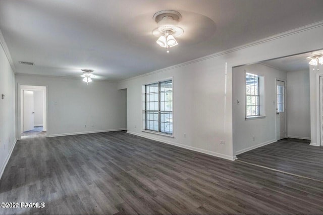 unfurnished room featuring ornamental molding, dark hardwood / wood-style flooring, and ceiling fan