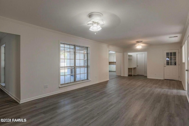 unfurnished living room with dark wood-type flooring, ceiling fan, and crown molding