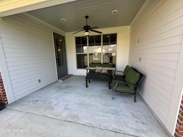 view of patio / terrace featuring ceiling fan