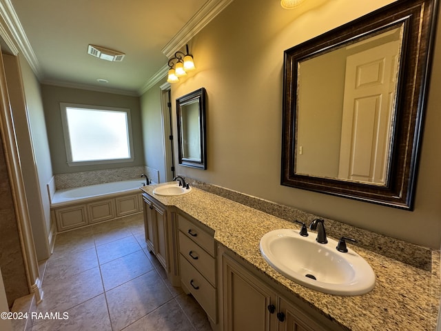 bathroom featuring crown molding, vanity, a bathtub, and tile patterned flooring