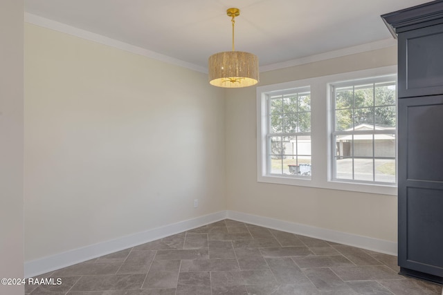 empty room featuring ornamental molding