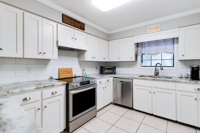 192 Tillou Andrus Dr, Opelousas, LA 70570 - kitchen featuring under cabinet range hood, stainless steel appliances, crown molding, and a sink