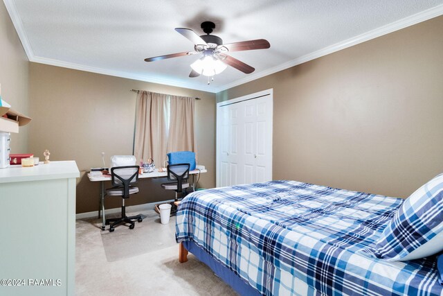 192 Tillou Andrus Dr, Opelousas, LA 70570 - bedroom with a closet, light colored carpet, baseboards, and ornamental molding