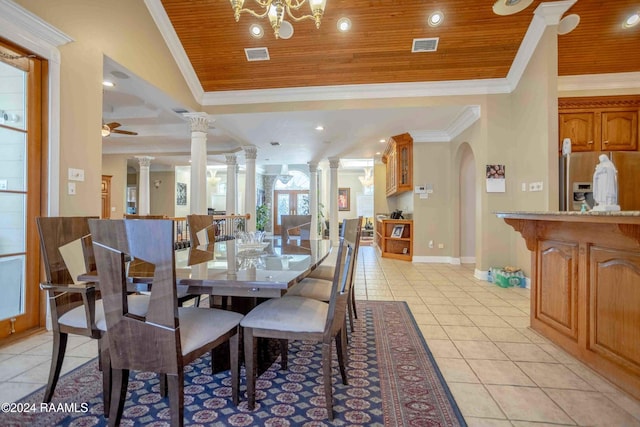 dining room with wood ceiling, lofted ceiling, light tile patterned floors, ornamental molding, and ceiling fan with notable chandelier