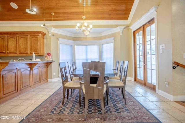 dining area with wood ceiling, light tile patterned flooring, french doors, ornamental molding, and a chandelier