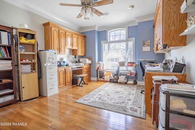 office area featuring ceiling fan, light hardwood / wood-style flooring, and ornamental molding