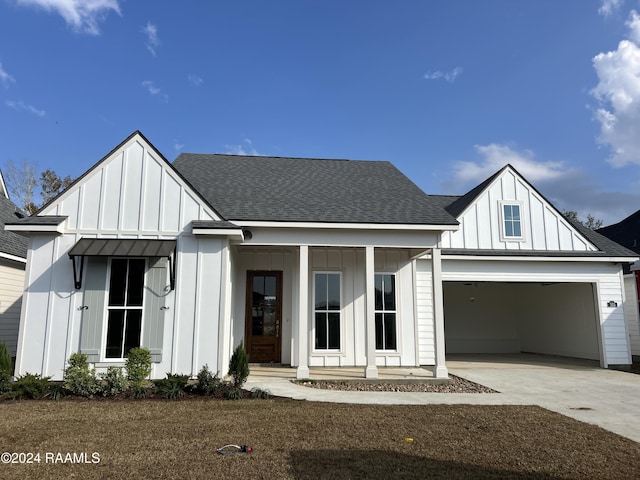 modern inspired farmhouse featuring a garage