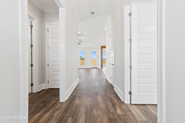 hall with baseboards, dark wood finished floors, and crown molding