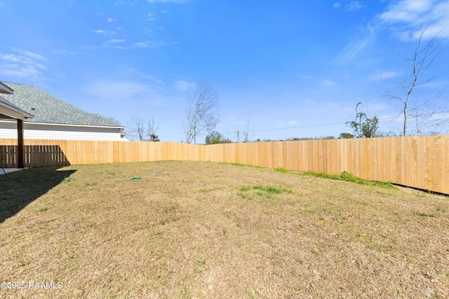 view of yard featuring fence