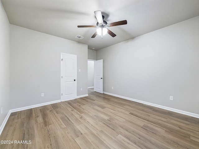 unfurnished bedroom featuring light hardwood / wood-style floors and ceiling fan