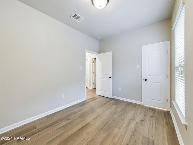 unfurnished bedroom featuring light hardwood / wood-style flooring