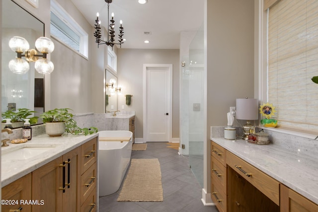 bathroom with vanity, independent shower and bath, and tile patterned floors