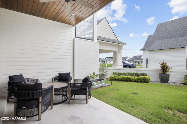 view of patio featuring ceiling fan