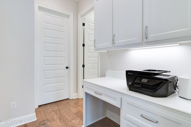 home office featuring light hardwood / wood-style flooring