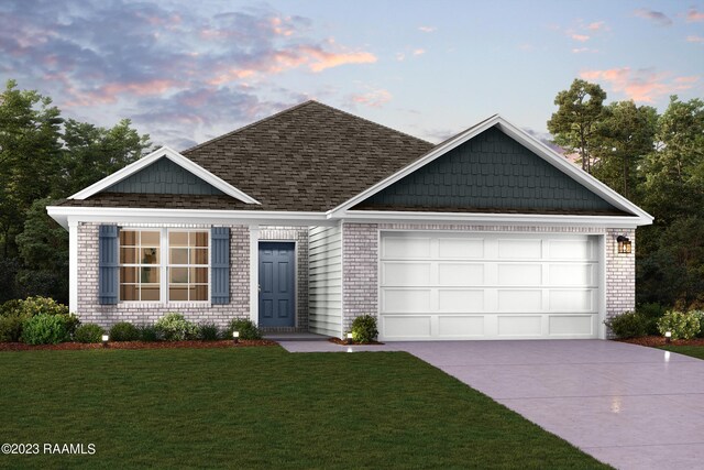 view of front of house featuring a front lawn, driveway, a shingled roof, and a garage
