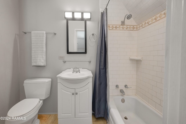 full bathroom featuring vanity, lofted ceiling, shower / bath combination with curtain, and toilet