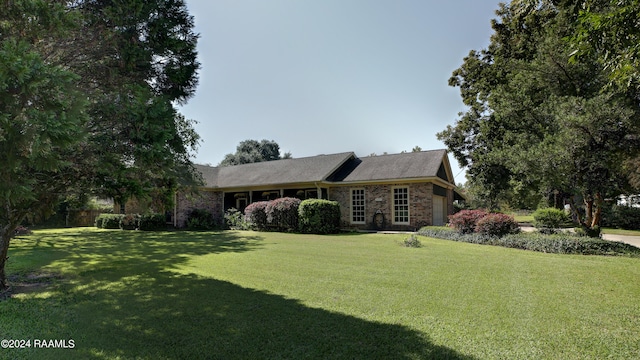 view of front of house with a front yard