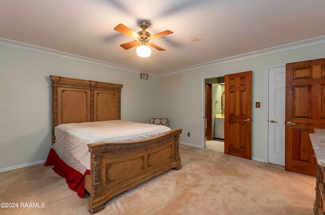 bedroom featuring ceiling fan, connected bathroom, light colored carpet, and crown molding