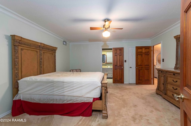 bedroom featuring light carpet, ceiling fan, ensuite bathroom, and crown molding