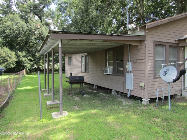 view of home's exterior with a yard