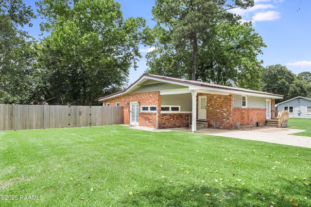 155 Emerite Dr, Lafayette, LA 70506 - view of side of property featuring brick siding, entry steps, and a gate