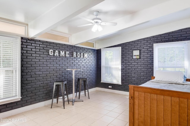 155 Emerite Dr, Lafayette, LA 70506 - bar featuring tile patterned flooring, baseboards, brick wall, and a ceiling fan
