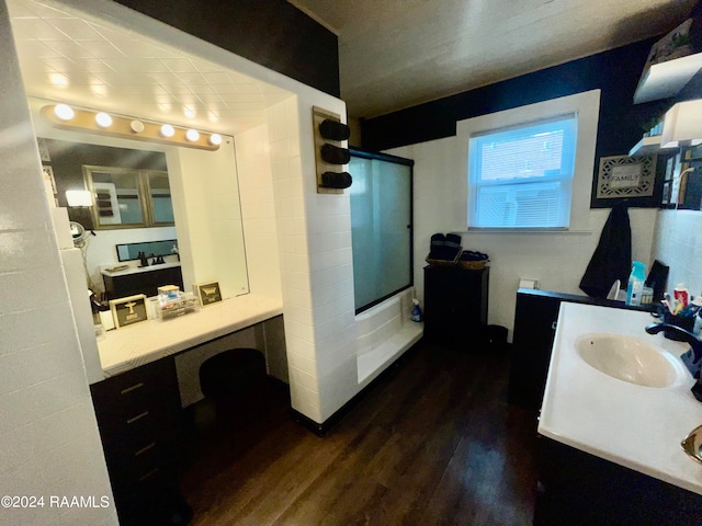 bathroom with wood-type flooring and vanity