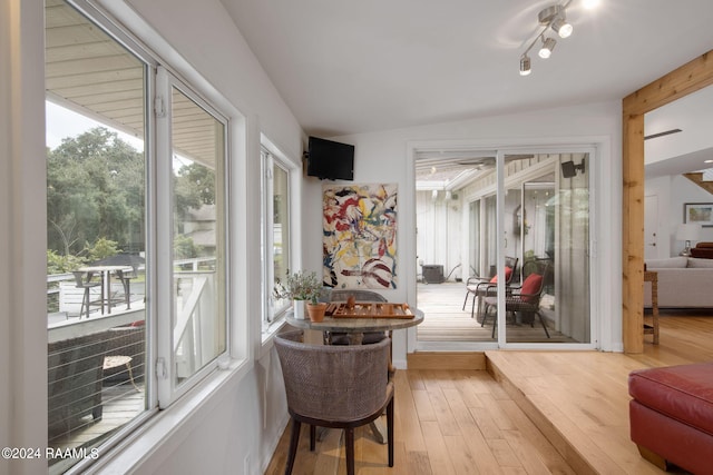 sunroom featuring hardwood / wood-style floors