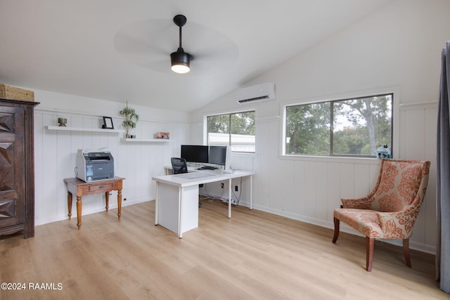 home office with a wall mounted air conditioner, a decorative wall, light wood-style floors, ceiling fan, and lofted ceiling