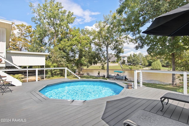 view of pool featuring a wooden deck