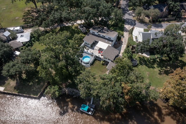 drone / aerial view with a water view