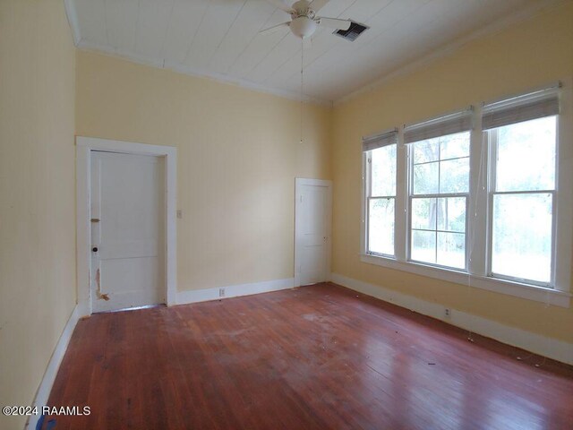 unfurnished room with wood-type flooring, ceiling fan, and crown molding