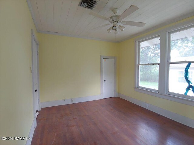 spare room featuring wood ceiling, ceiling fan, and dark hardwood / wood-style floors