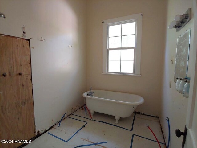 bathroom featuring a bath