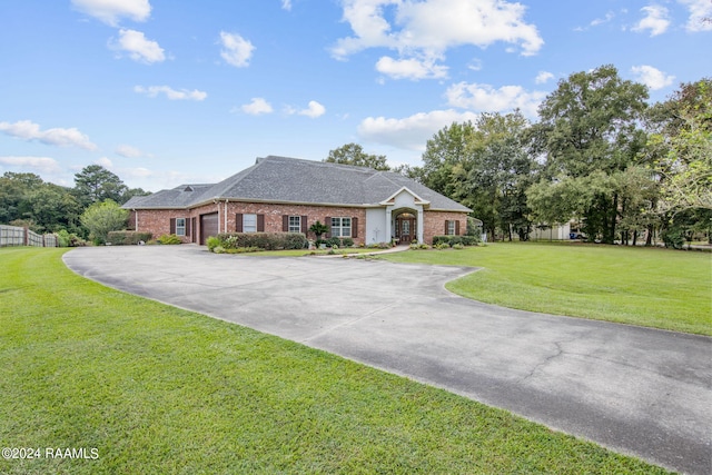 single story home with a front yard