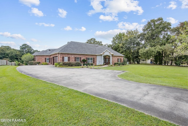110 River Wood Pl, Abbeville, LA 70510 - single story home featuring a garage, brick siding, driveway, a front lawn, and a shingled roof