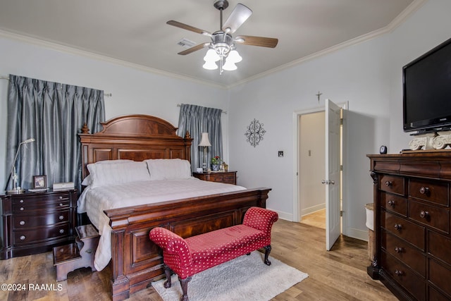 bedroom with ceiling fan, light hardwood / wood-style flooring, and ornamental molding