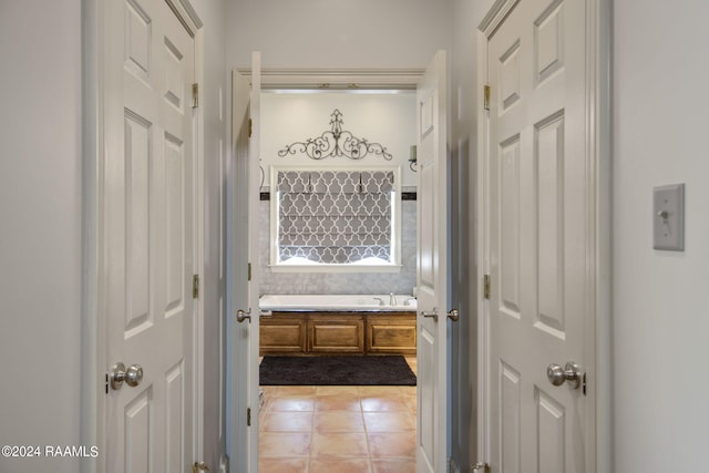 110 River Wood Pl, Abbeville, LA 70510 - hallway with light tile patterned floors