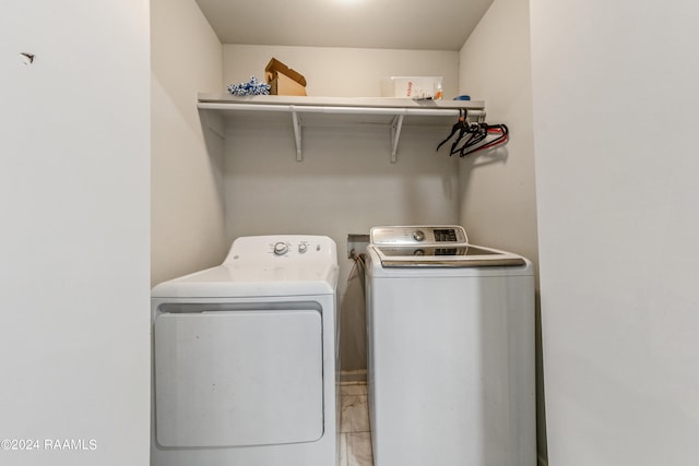 laundry room with washer and clothes dryer