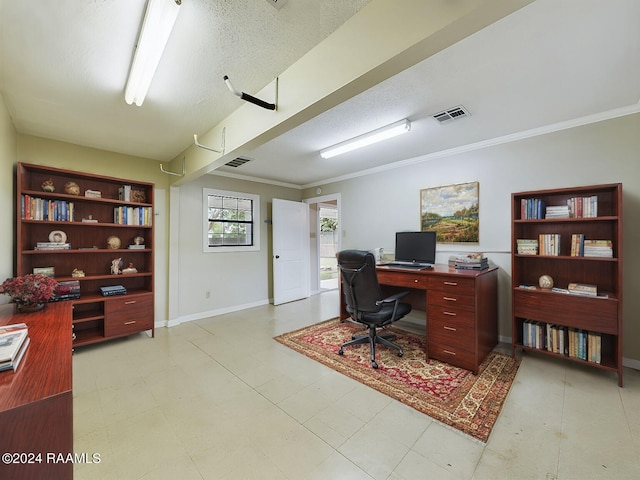 office area featuring a textured ceiling and ornamental molding