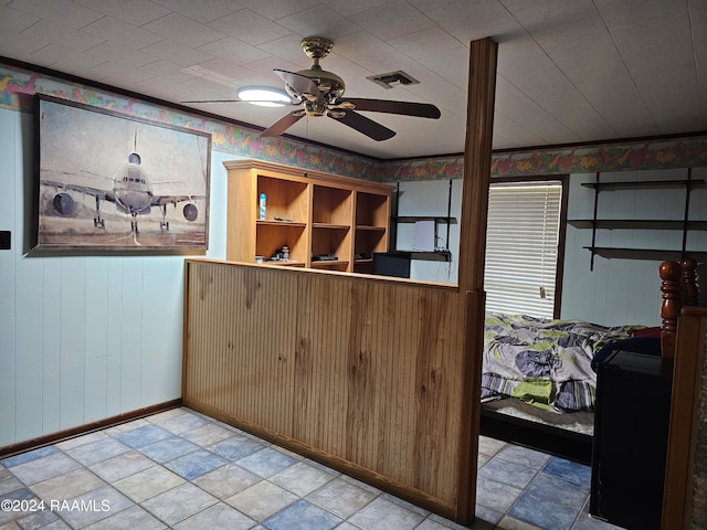 interior space featuring ceiling fan