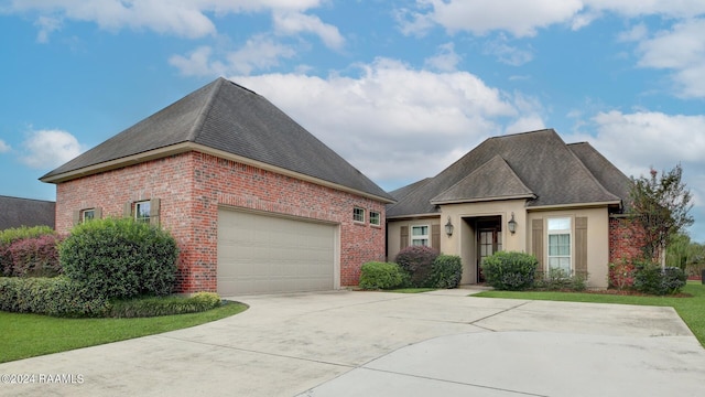 view of front of home with a garage