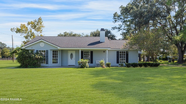 ranch-style house with a front lawn